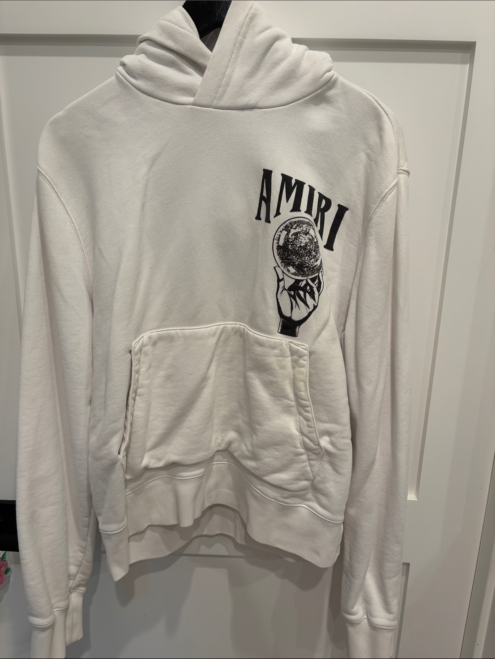 AMIRI White Hoodie with Black Graphic Hand and Globe